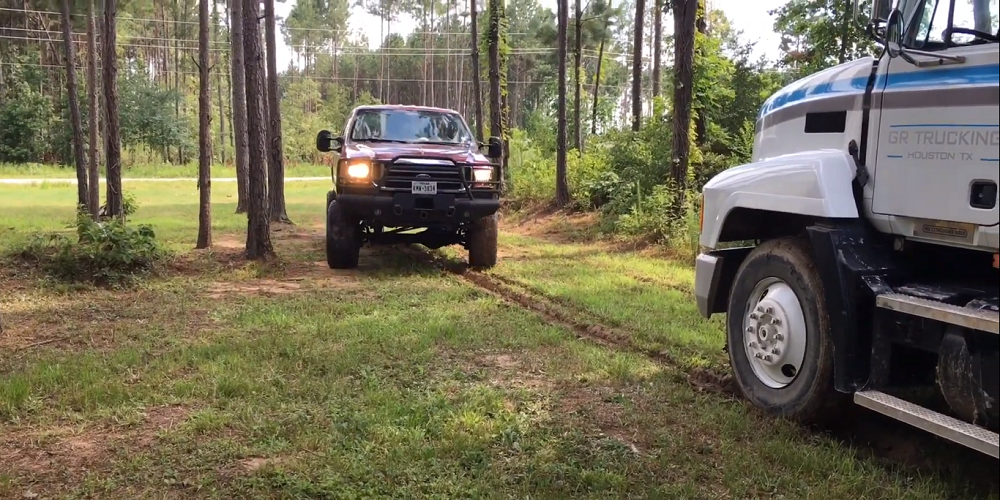 f150online.com Diesel Super Duty Yanks a Mack Truck Out of the Mud - Twice