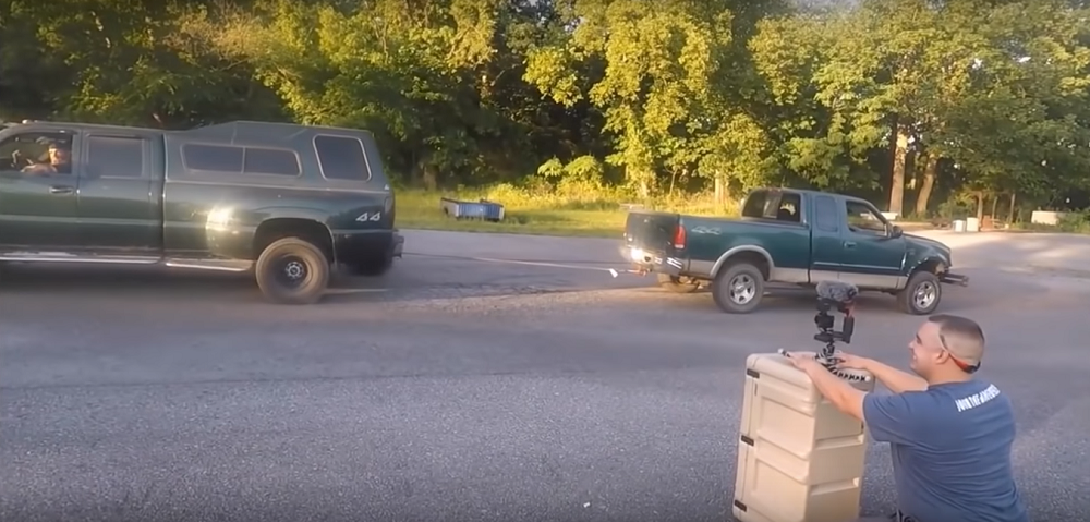 f150online.com Beat-Up Ford F-150 Drags a Duramax-Powered GMC Sierra 3500 Dually