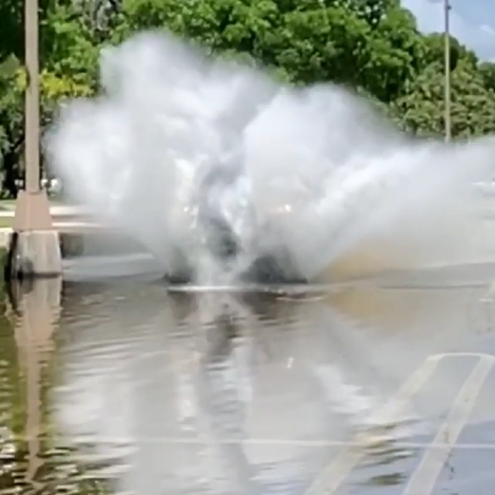 f150online.com Ford Driver Beats Boredom with Epic Splash Through Parking Lot