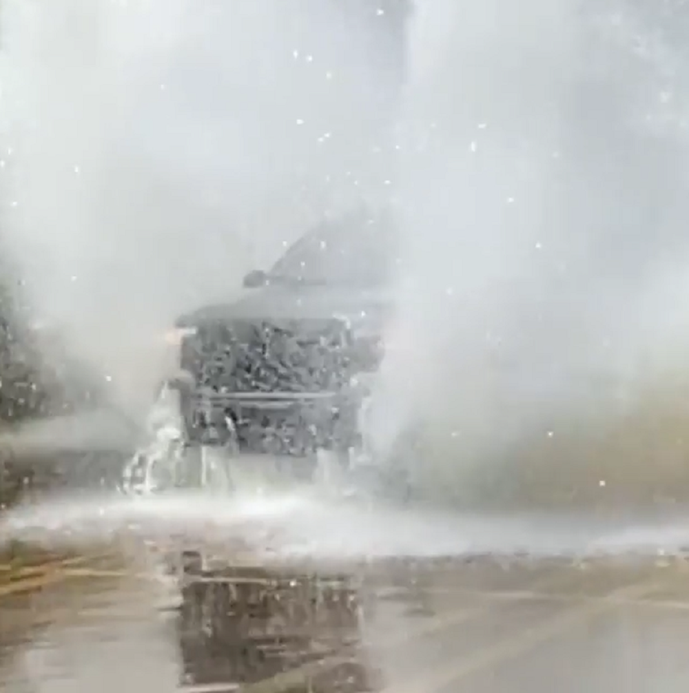 f150online.com Ford Driver Beats Boredom with Epic Splash Through Parking Lot